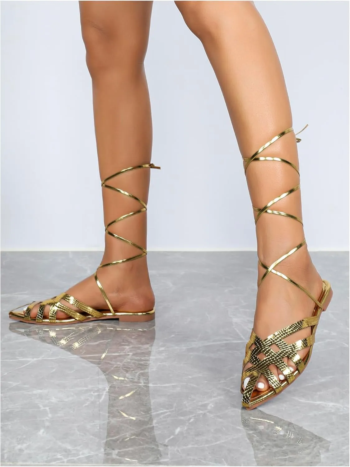 GORGLITTER Women's Metallic Lace Up Flat Sandals Pointy Toe Wrap Tie Up Gladiator Sandals